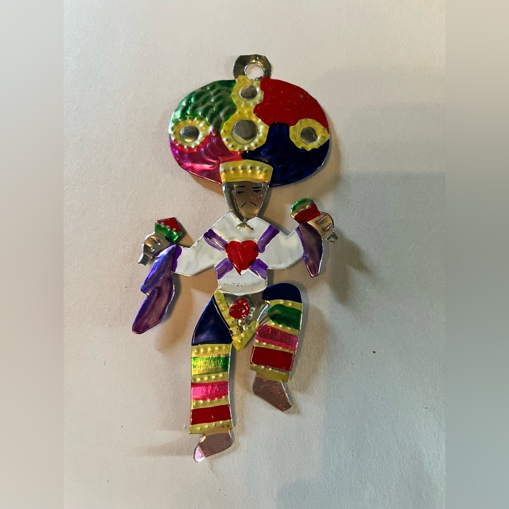 Hand painted Mexican tin art, colorful dancer